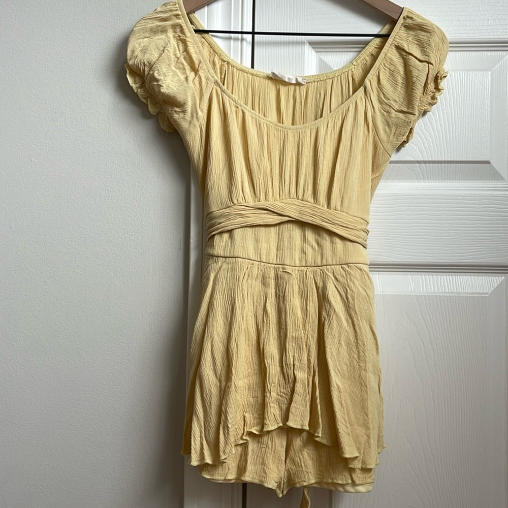 Altar'd State romper in faded yellow